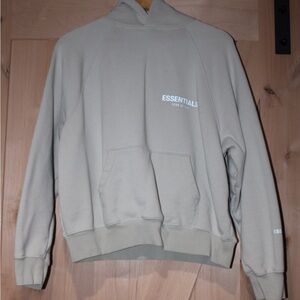 FEAR OF GOD ESSENTIALS
SSENSE Exclusive Green Pullover Hoodie